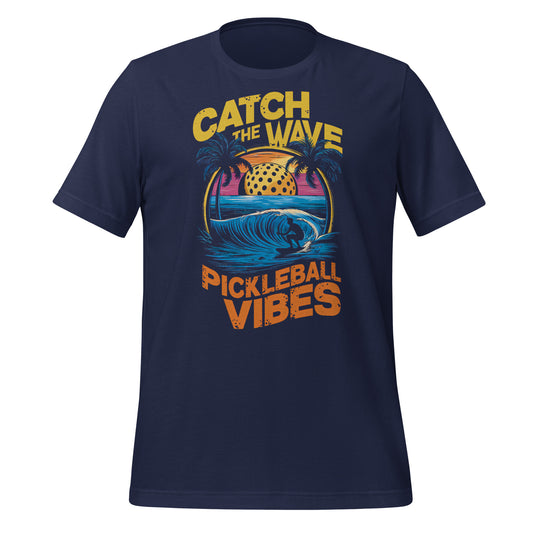 Navy t-shirt with “Catch the Wave Pickleball Vibes” graphic featuring a surfer, pickleball, and palm trees.