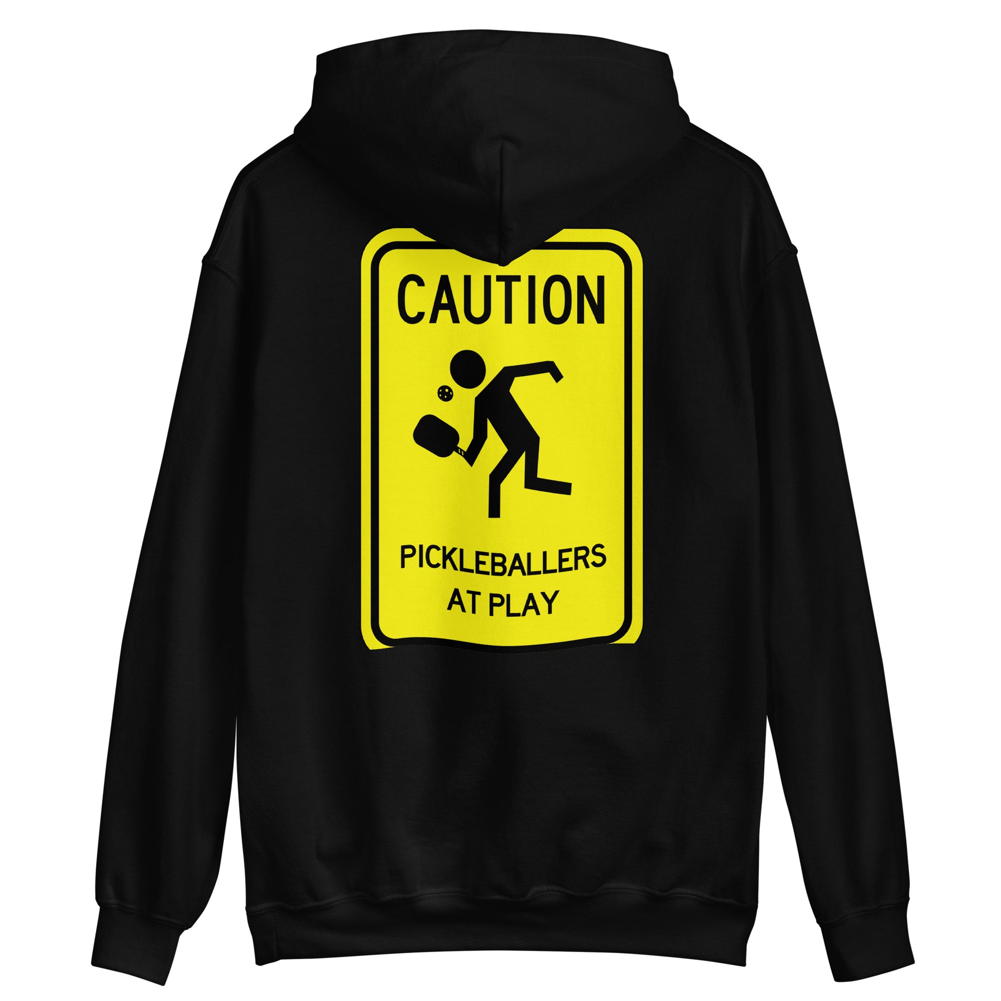 Black hoodie with a bright yellow caution sign graphic that reads “Caution Pickleballers at Play” featuring a stick figure playing pickleball.