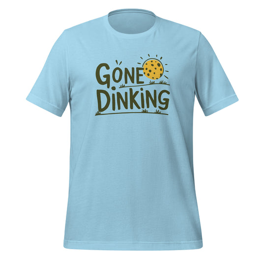 Light blue pickleball t-shirt with “Gone Dinking” graphic featuring a pickleball sun and grassy field.